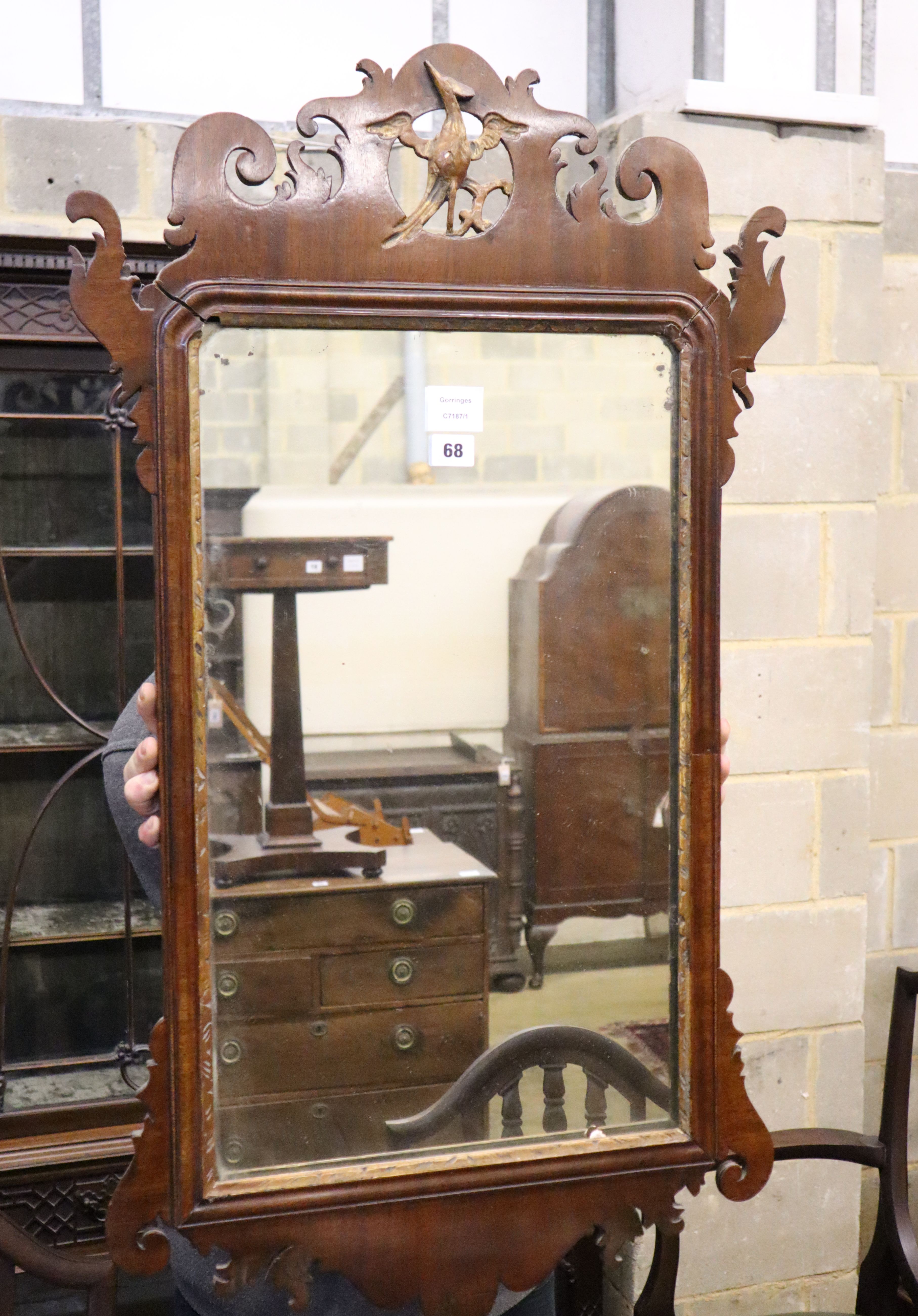 A George III style mahogany fret frame wall mirror, width 52cm, 93cm high